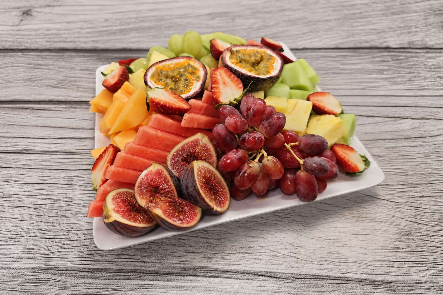 Refined fruit platter with open figs